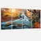 Designart - Fast Flowing Fall River in Forest - Landscape Photography Canvas Print